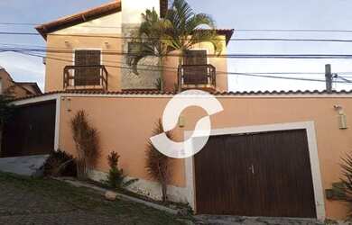 Imagem: A casa possui 4 Dormitórios, 4 Banheiros, 5 Vagas na garagem