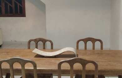 Imagem: A casa possui 3 Dormitórios, 3 Vagas na garagem e está localizado