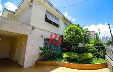 Imagem: A casa possui 3 Dormitórios, 3 Banheiros, 2 Vagas na garagem