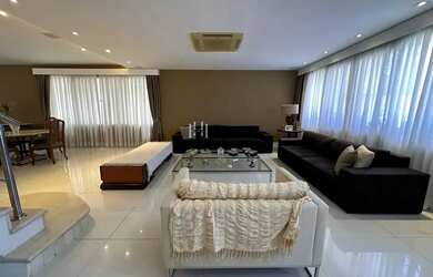 Imagem 2: Residência sofisticada com 4 suítes, energia solar e amplo lazer