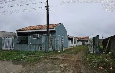 Imagem: A casa possui 2 Dormitórios, 1 Banheiro, 1 Vaga na garagem