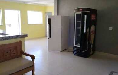 Imagem: A casa possui 2 Dormitórios, 3 Banheiros, 4 Vagas na garagem