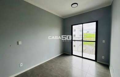 Imagem: O apartamento possui 2 Dormitórios, 1 Banheiro, 1 Vaga na garagem