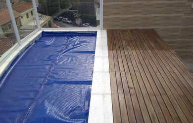 Imagem: A casa possui 3 Dormitórios, 3 Banheiros, 5 Vagas na garagem