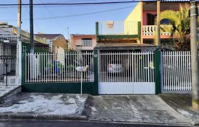 Imagem: A casa possui 2 Dormitórios, 2 Banheiros, 3 Vagas na garagem