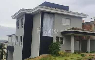 Imagem: A casa possui 4 Dormitórios, 2 Banheiros, 4 Vagas na garagem