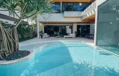 Imagem: A casa em condomínio possui 4 Dormitórios, 5 Banheiros, 4