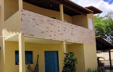 Imagem: A casa possui 4 Dormitórios, 4 Vagas na garagem e está localizado