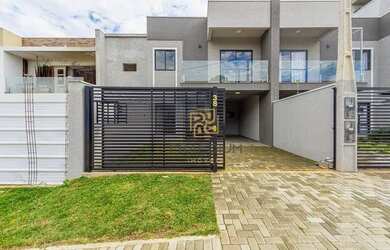 Imagem: A casa possui 3 Dormitórios, 2 Banheiros, 2 Vagas na garagem