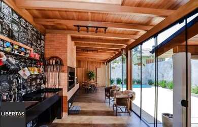 Imagem 4: Casa semi mobiliada com churrasqueira e piscina no bairro Ecoville