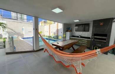 Imagem: A casa possui 4 Dormitórios, 3 Banheiros, 5 Vagas na garagem