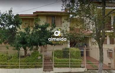 Imagem: A casa possui 3 Dormitórios, 5 Banheiros, 3 Vagas na garagem