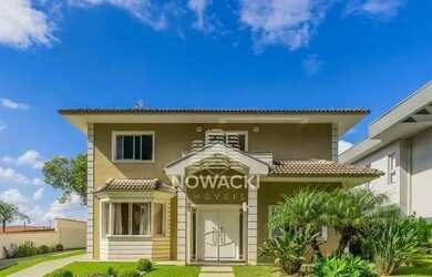 Imagem: A casa em condomínio possui 4 Dormitórios, 5 Banheiros, 5