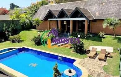 Imagem: A casa em condomínio possui 4 Dormitórios, 4 Banheiros, 5