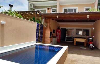 Imagem: A casa em condomínio possui 3 Dormitórios, 3 Banheiros, 2