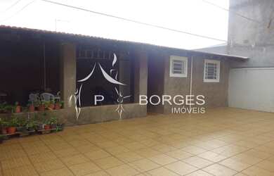 Imagem: A casa possui 3 Dormitórios, 3 Banheiros, 3 Vagas na garagem