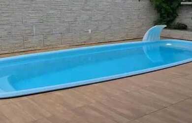 Imagem: A casa possui 3 Dormitórios, 1 Banheiro, 1 Vaga na garagem