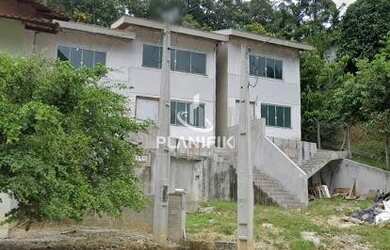 Imagem: A casa possui 3 Dormitórios, 3 Banheiros, 1 Vaga na garagem
