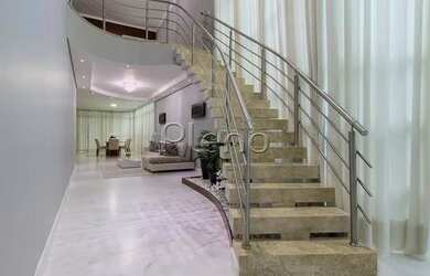 Imagem 2: Venda Casa com 467,00 metroQuadrado, 5 dormitório s , 4 vaga s . Swiss...