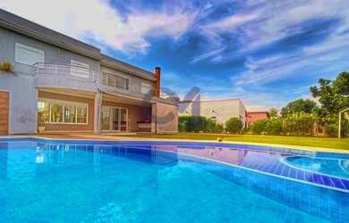 Imagem: A casa em condomínio possui 3 Dormitórios, 4 Banheiros, 5