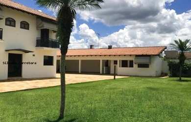 Imagem: A casa possui 5 Dormitórios, 5 Banheiros, 5 Vagas na garagem