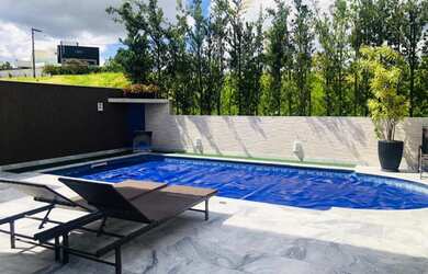 Imagem: A casa em condomínio possui 4 Dormitórios, 5 Banheiros, 4