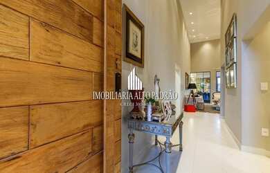 Imagem: A casa em condomínio possui 4 Dormitórios, 5 Banheiros, 4