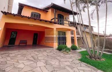 Imagem: A casa em condomínio possui 3 Dormitórios, 3 Banheiros, 2