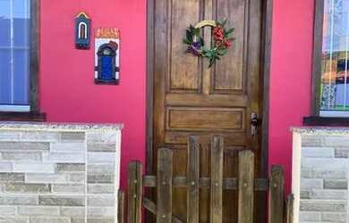 Imagem: A casa possui 1 Dormitório e 1 Vaga na garagem e está localizado