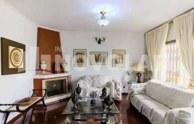 Imagem: A casa possui 5 Dormitórios, 5 Banheiros, 4 Vagas na garagem