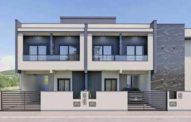 Imagem: A casa possui 3 Dormitórios, 3 Banheiros, 2 Vagas na garagem