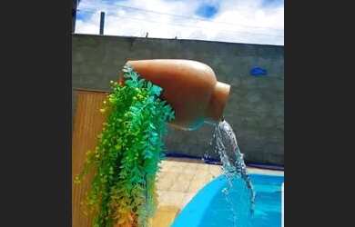 Imagem: A casa possui 3 Dormitórios, 3 Banheiros e 4 Vagas na garagem