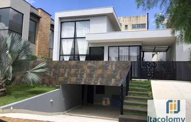 Imagem: A casa em condomínio possui 4 Dormitórios, 5 Banheiros, 2