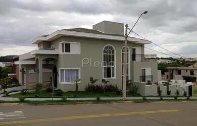 Imagem: A casa em condomínio possui 4 Dormitórios, 5 Banheiros, 360m²