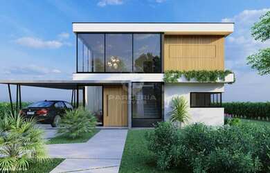 Imagem: A casa possui 3 Dormitórios, 4 Banheiros, 1 Vaga na garagem