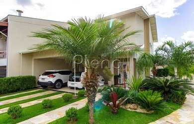 Imagem: A casa possui 3 Dormitórios, 3 Banheiros, 5 Vagas na garagem