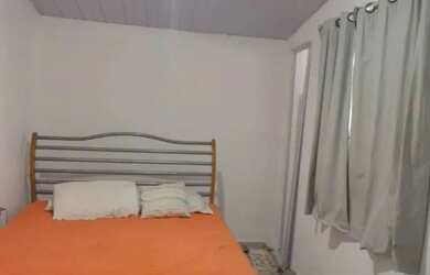 Imagem: A casa possui 3 Dormitórios, Acomodam 20 pessoas, 3 Vagas na