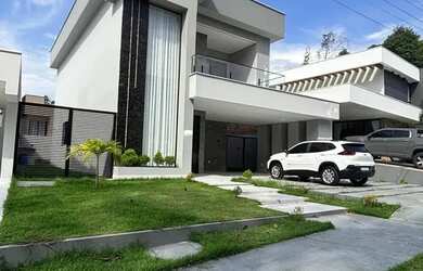 Imagem: A casa em condomínio possui 4 Dormitórios, 5 Banheiros, 4