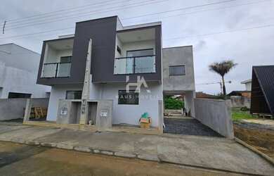 Imagem: A casa possui 2 Dormitórios, 1 Banheiro, 1 Vaga na garagem