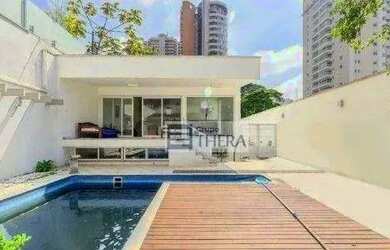 Imagem: A casa possui 3 Dormitórios, 5 Banheiros, 5 Vagas na garagem