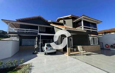 Imagem: A casa possui 5 Dormitórios, 3 Banheiros, 3 Vagas na garagem