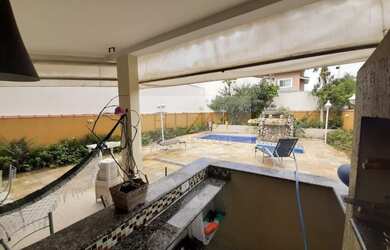 Imagem: A casa em condomínio possui 4 Dormitórios, 4 Banheiros, 4