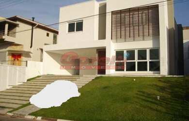 Imagem: A casa em condomínio possui 5 Dormitórios, 5 Banheiros, 4