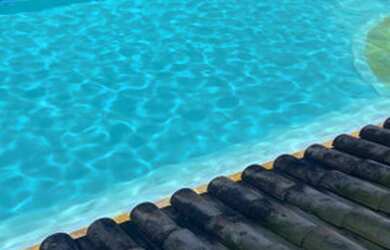 Imagem: A casa possui 2 Dormitórios, 1 Banheiro, 2 Vagas na garagem