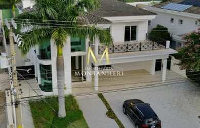 Imagem: A casa em condomínio possui 5 Dormitórios, 5 Banheiros, 5