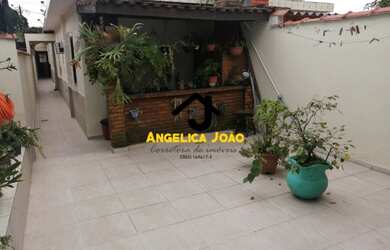 Imagem: A casa possui 2 Dormitórios, 3 Banheiros, 1 Vaga na garagem