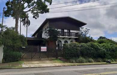 Imagem: A casa em condomínio possui 4 Dormitórios, 5 Banheiros, 3