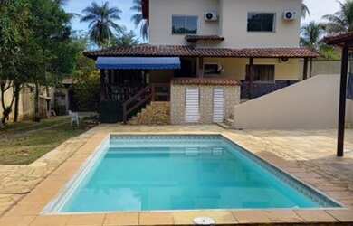 Imagem: A casa possui 5 Dormitórios, 5 Vagas na garagem, Churrasqueira