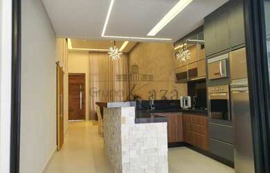 Imagem: A casa possui 3 Dormitórios, 3 Banheiros, 2 Vagas na garagem