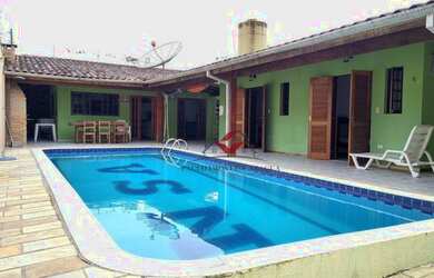 Imagem: A casa possui 3 Dormitórios, 1 Banheiro, 5 Vagas na garagem